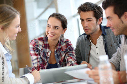 Young people meeting with digital tablet photo