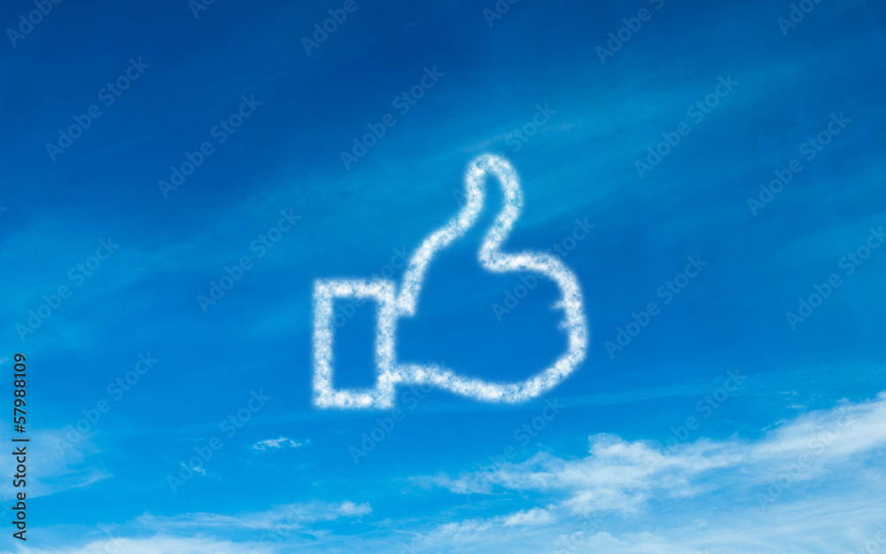 Fototapeta premium White thumb up icon in sky