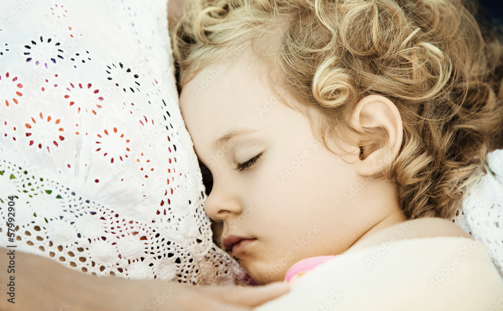 Mother and daughter sleeping on sofa at home, close up photo Mother and daughter sleeping on sofa at home, close up photo