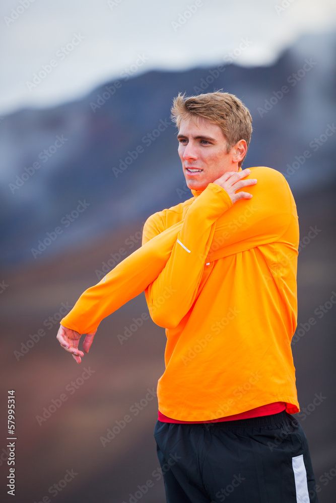 Young attractive athletic man, wearing sporty cloths on trail, s Young attractive athletic man, wearing sporty cloths on trail, s
