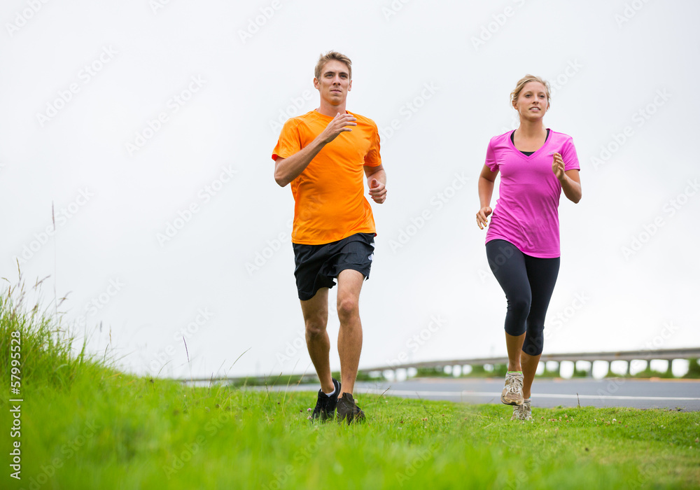 Fitness sport couple running jogging outside Fitness sport couple running jogging outside