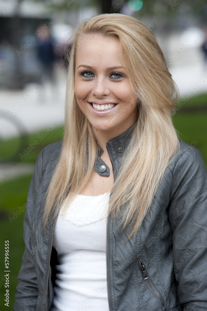 Very beautiful, happy, young girl on a cloudy day Very beautiful, happy, young girl on a cloudy day
