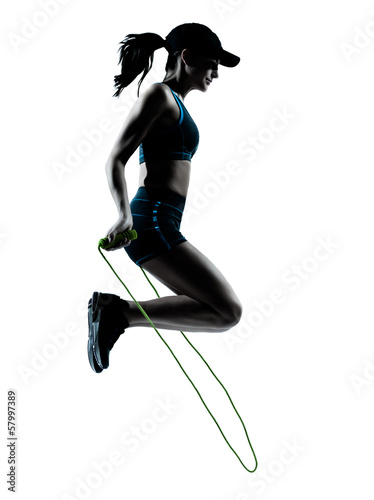 woman runner jogger jumping rope