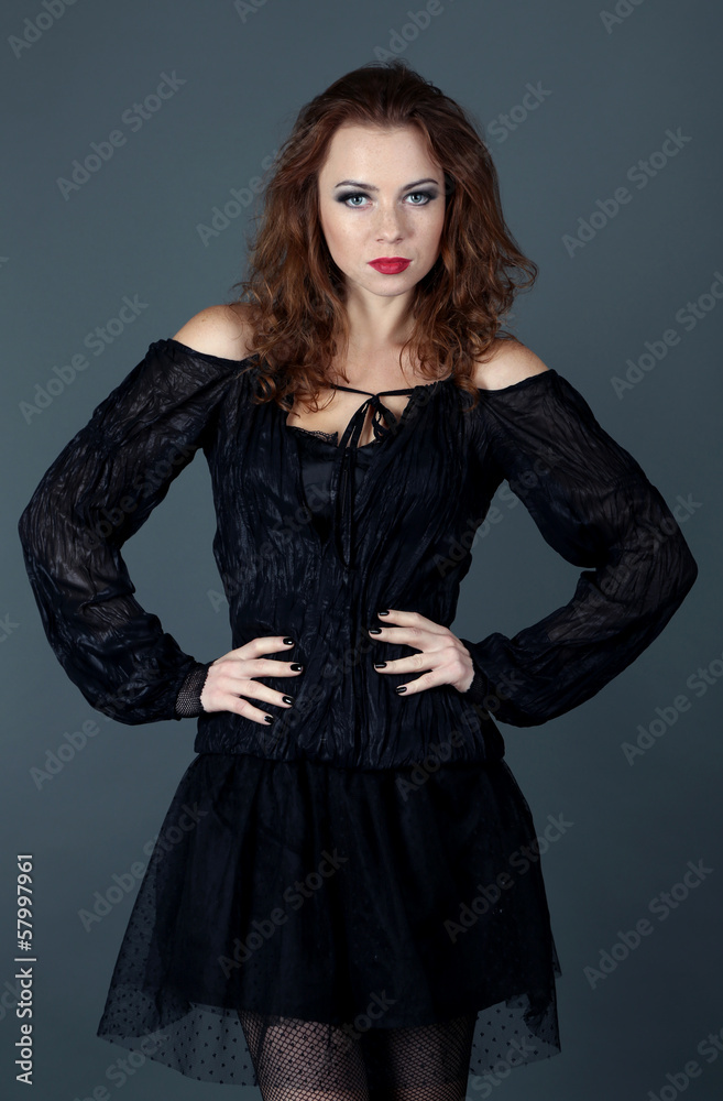 Halloween witch with broom on gray background Halloween witch with broom on gray background