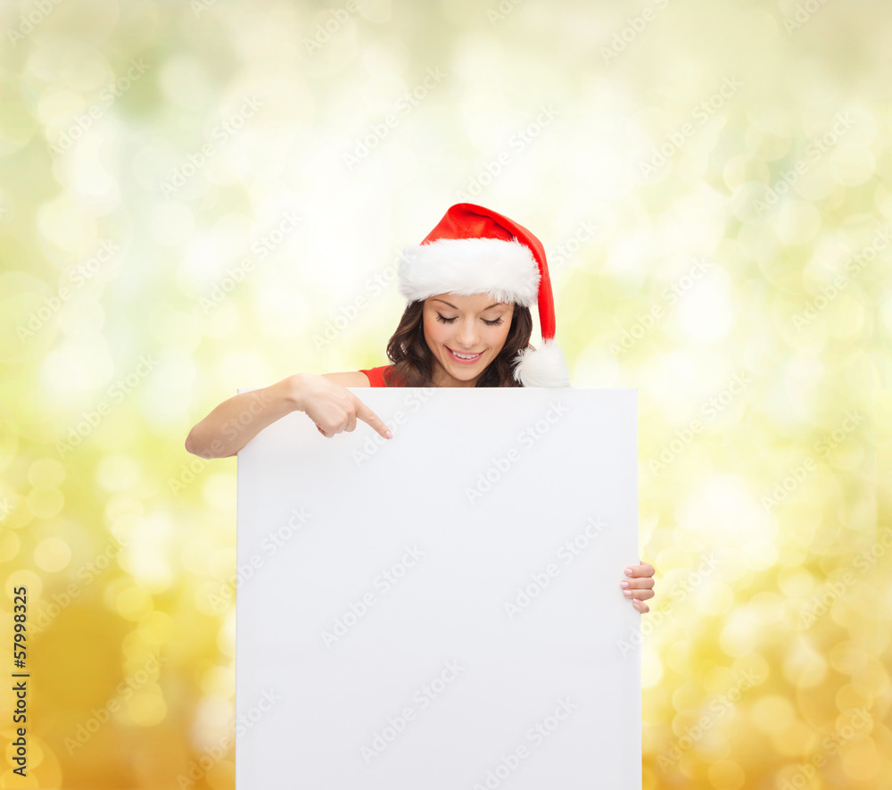 woman in santa helper hat with blank white board woman in santa helper hat with blank white board