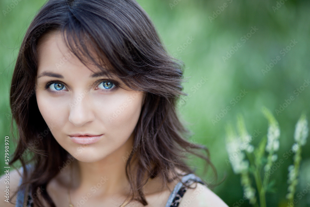 Portrait of brunet woman with big eyes