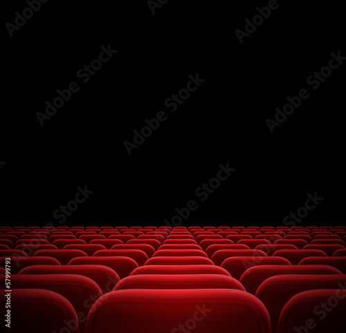 red seats in dark cinema theater