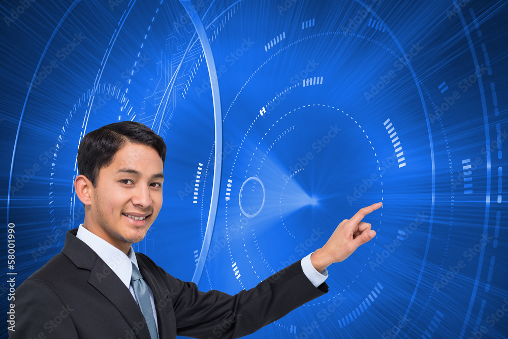 Composite image of smiling asian businessman pointing Composite image of smiling asian businessman pointing
