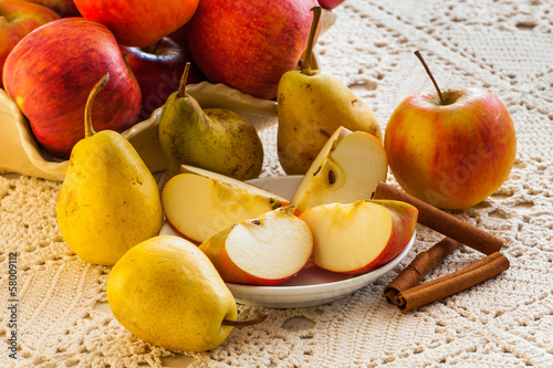 Apples  pears and cinnamon sticks