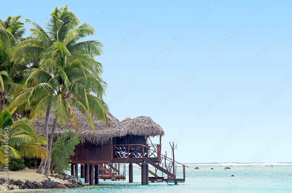 Reef Bungalows over tropical coral reef