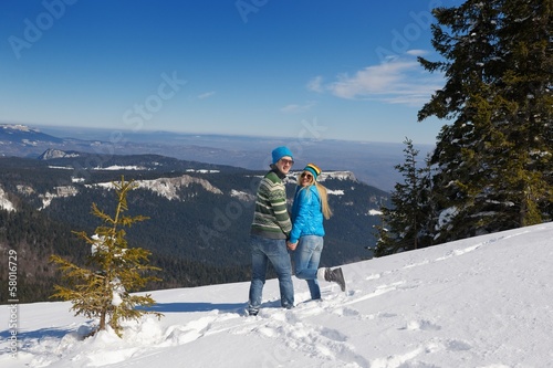 young couple on winter vacation