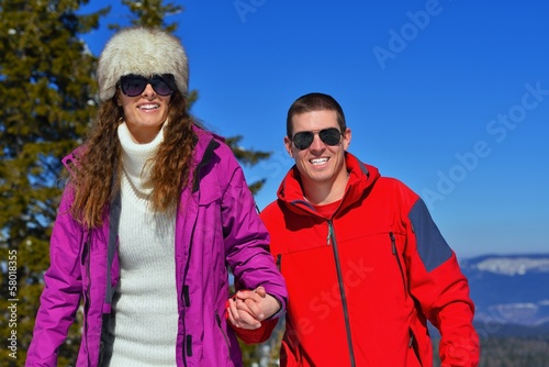 young couple on winter vacation
