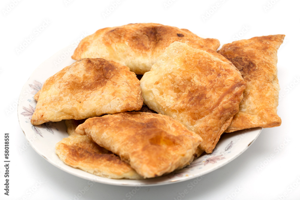 fresh tasty meat pies on a white background fresh tasty meat pies on a white background