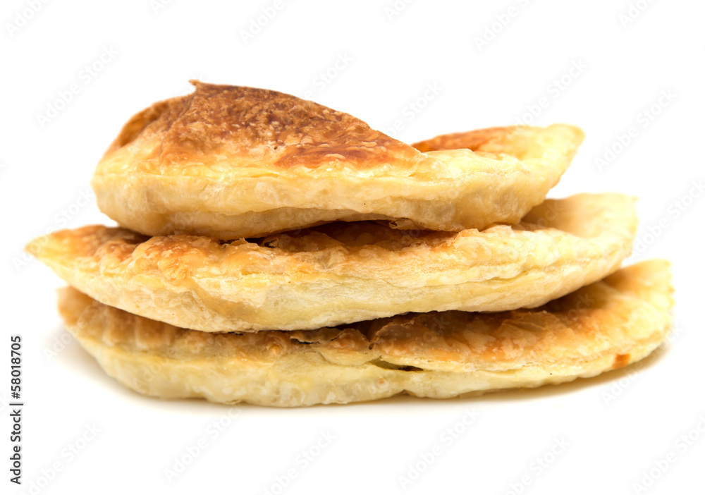 fresh tasty meat pies on a white background