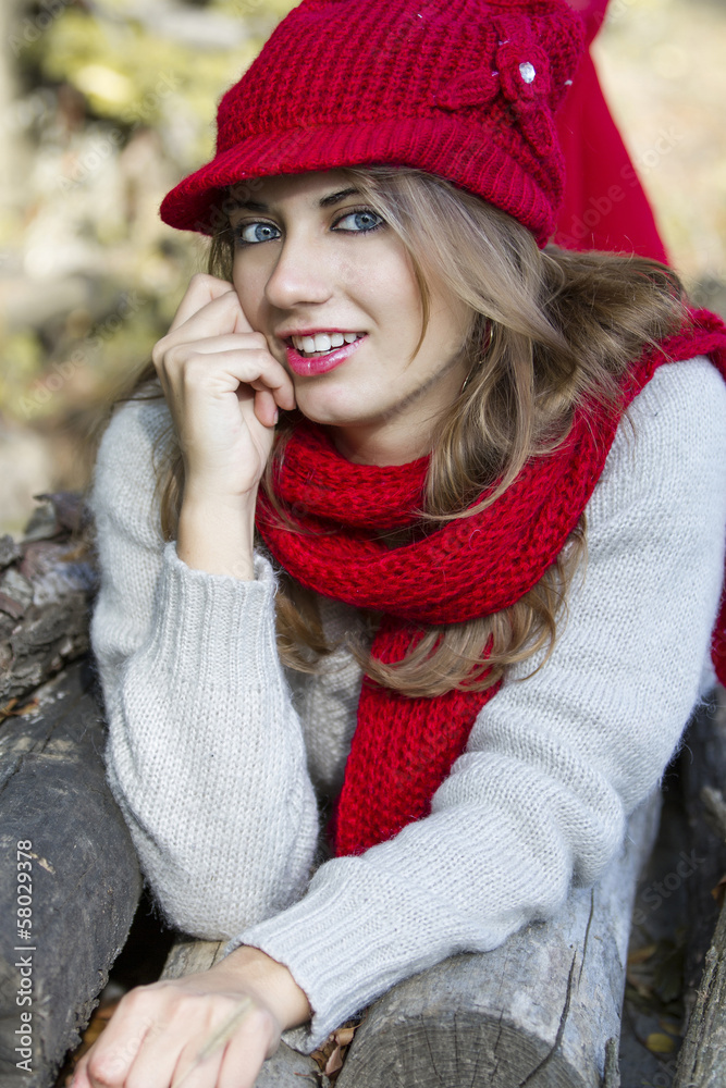 Girl with red hat and red scarf in autumn Girl with red hat and red scarf in autumn