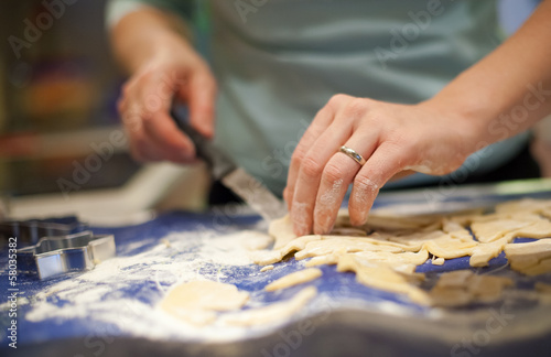 hands making biscuits