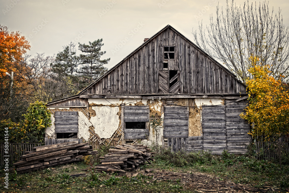 Old deserted wooden farm house.