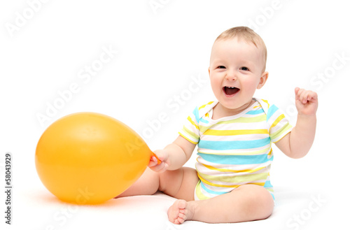 Happy baby with balloon