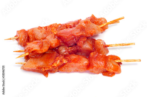 raw spiced chicken meat skewers photo