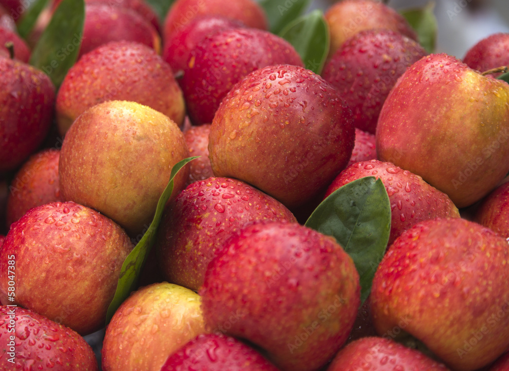 A market stall of apples
