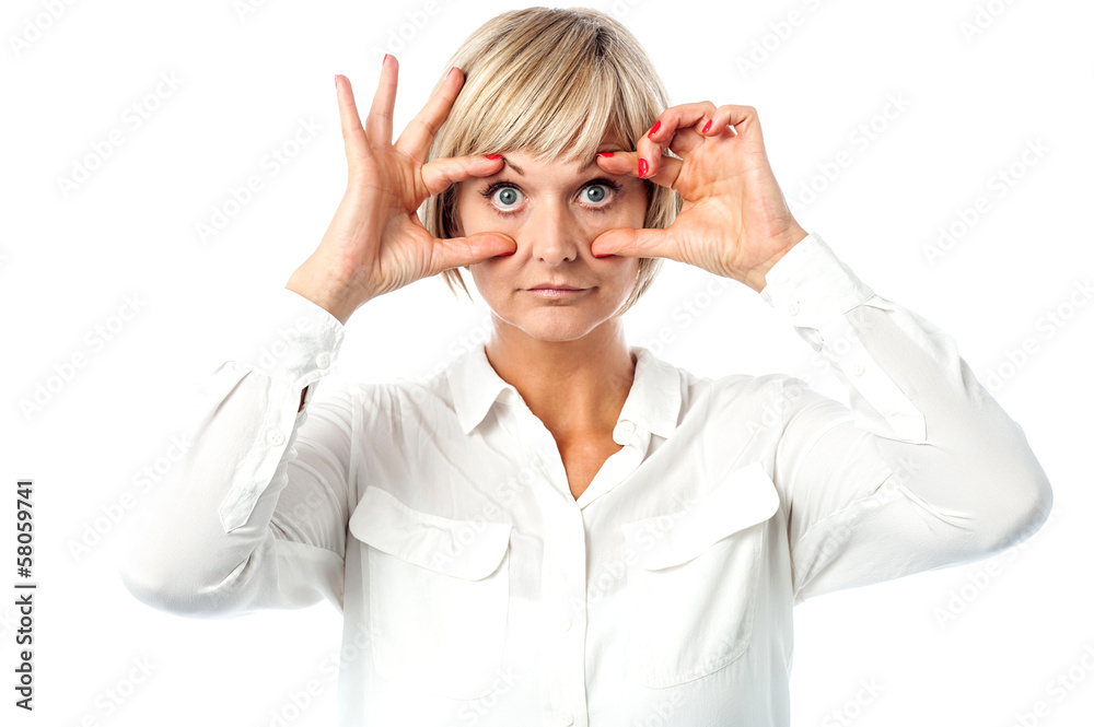 Matured woman with eyes wide open Matured woman with eyes wide open