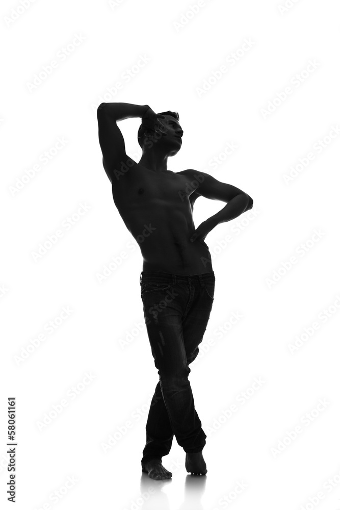 Silhouette of a young man dancer isolated
