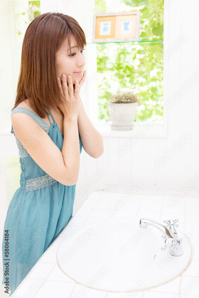 young asian woman relaxing in the bathroom young asian woman relaxing in the bathroom