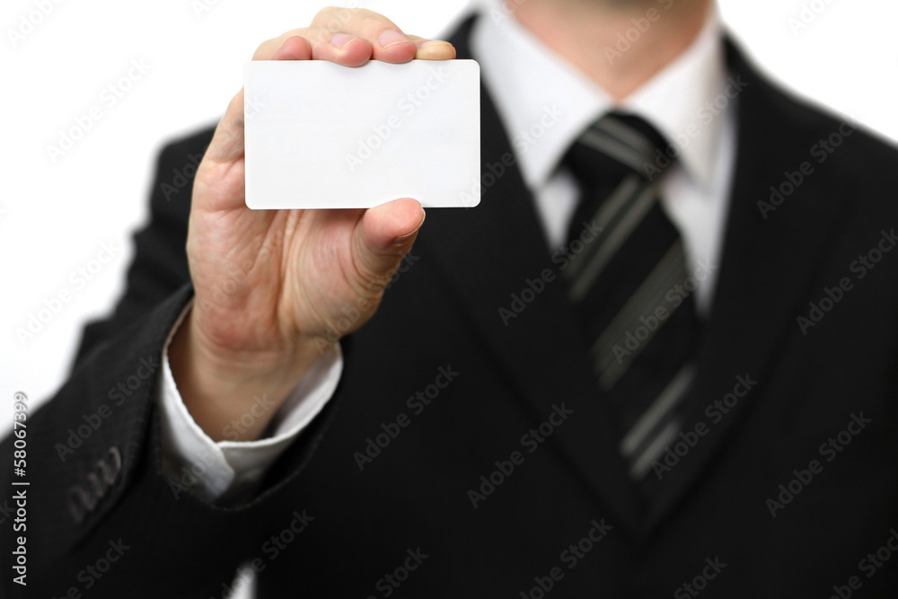 Man's hand showing business card Man's hand showing business card