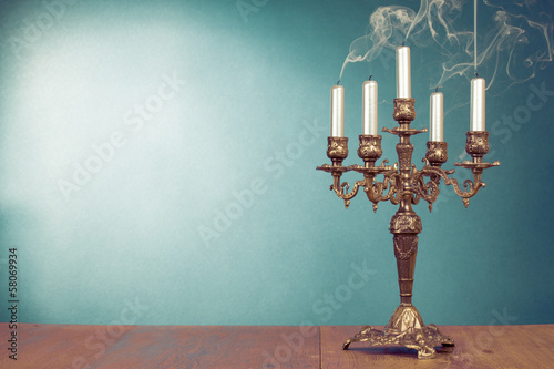 Φωτογραφία Vintage bronze candlestick with five reek candles