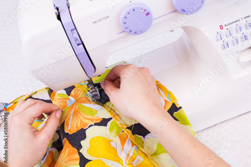 Working from home, a tailor at work. photo