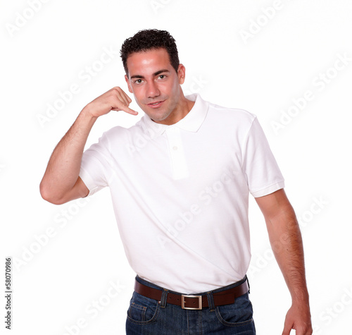 Charming guy standing with talking gesture