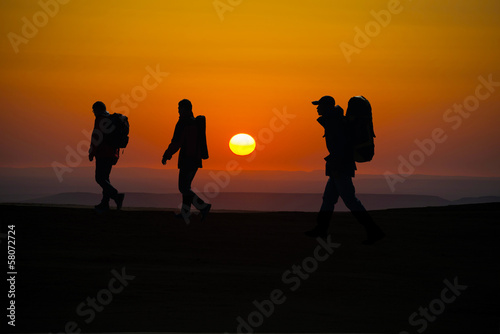 Walking in the sunglow hikers