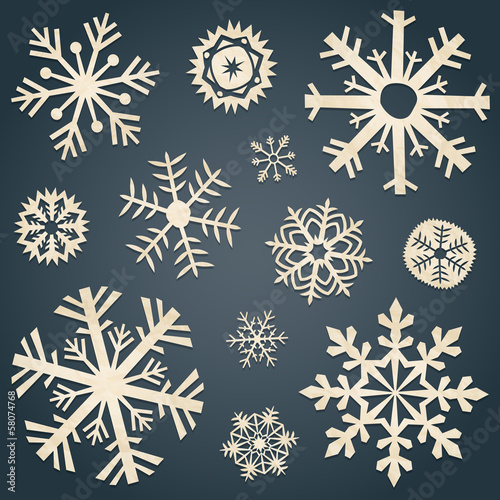 Set of snowflakes from old paper