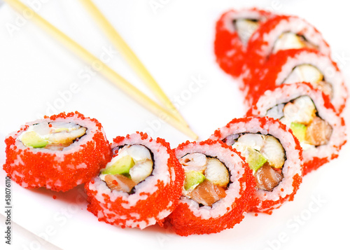 Japan sushi roll with salmon caviar isolated on white