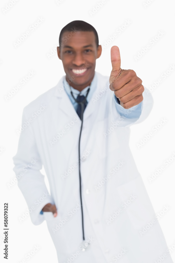 Portrait of a happy male doctor gesturing thumbs up Portrait of a happy male doctor gesturing thumbs up