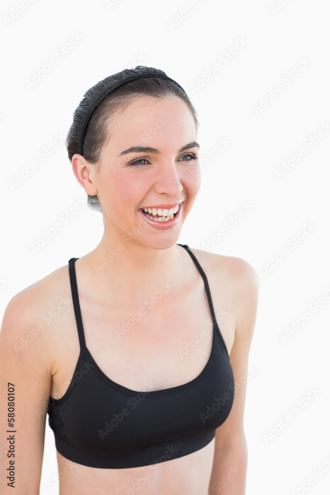 Close up of a sporty young woman smiling Close up of a sporty young woman smiling