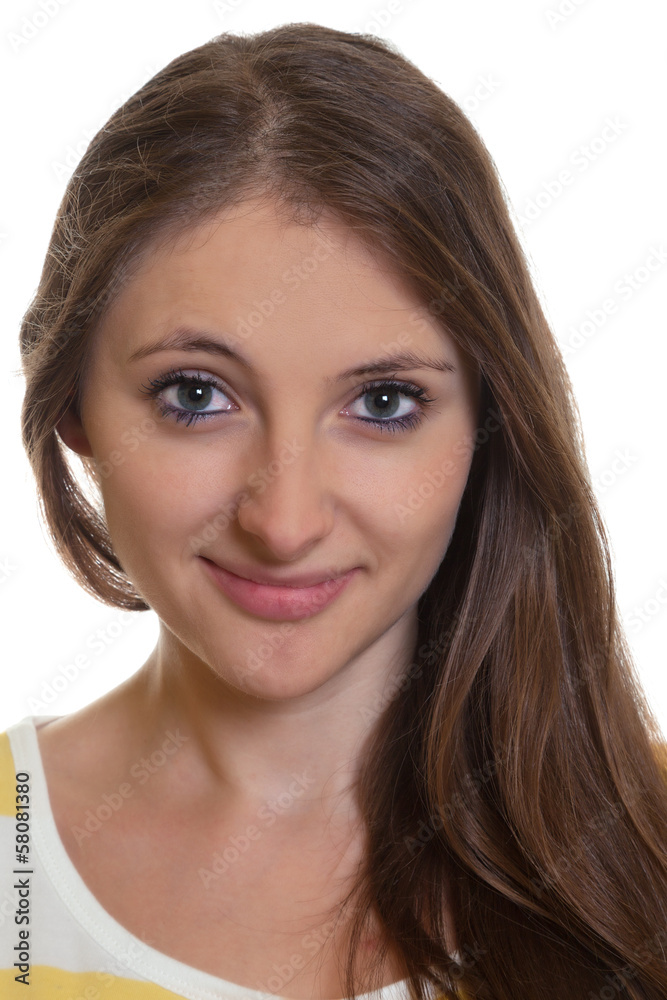 Woman with long brown hair looking at camera Woman with long brown hair looking at camera