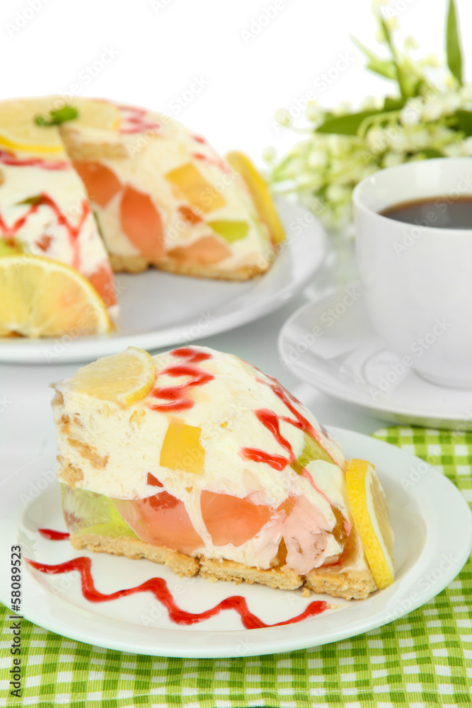 Delicious jelly cake on table on white background Delicious jelly cake on table on white background