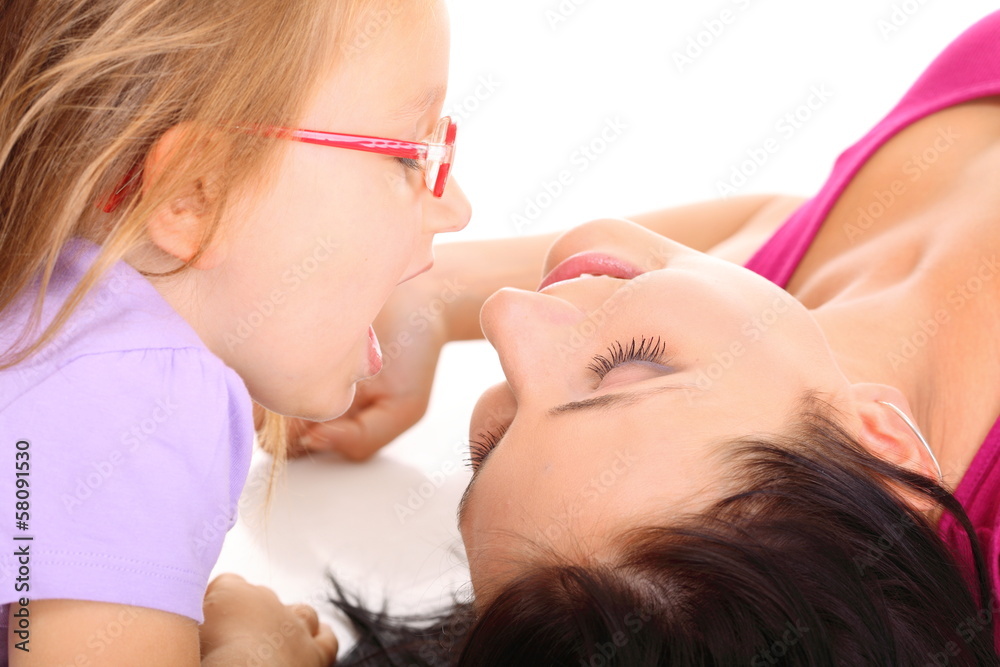 Happy family mother playing with her daughter Happy family mother playing with her daughter