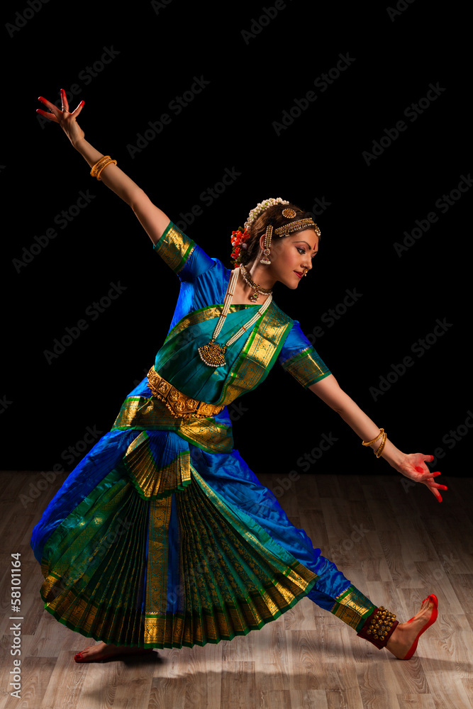 Fototapeta premium Beautiful girl dancer of Indian classical dance Bharatanatyam