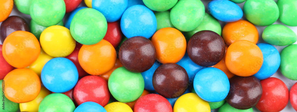 Backgroynd of chocolate balls in colorful glaze. Backgroynd of chocolate balls in colorful glaze.
