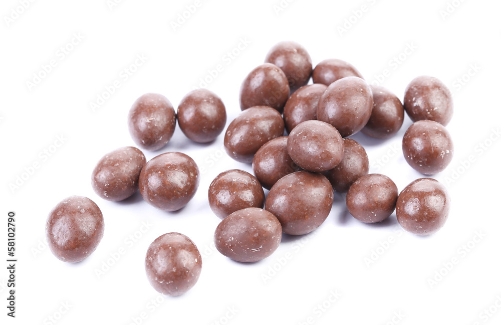Dark brown dragee in chocolate covered. Dark brown dragee in chocolate covered.