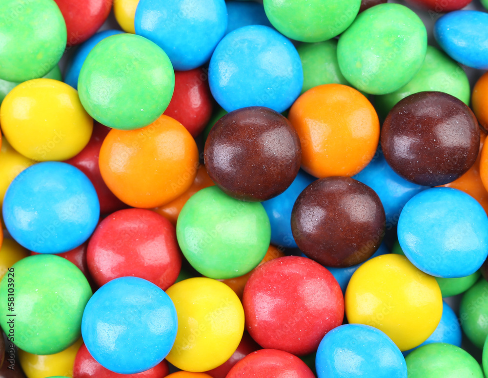 Backgroynd of chocolate balls in colorful glaze. Backgroynd of chocolate balls in colorful glaze.