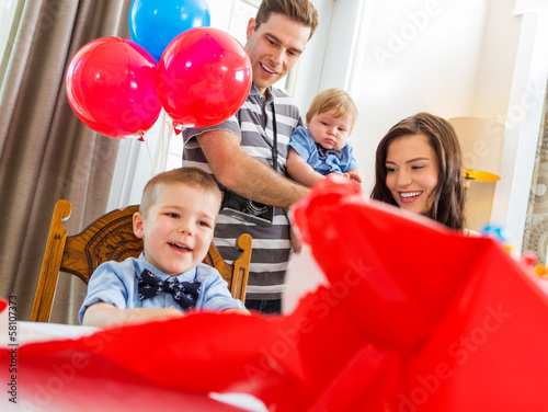 Family Celebrating Son's Birthday
