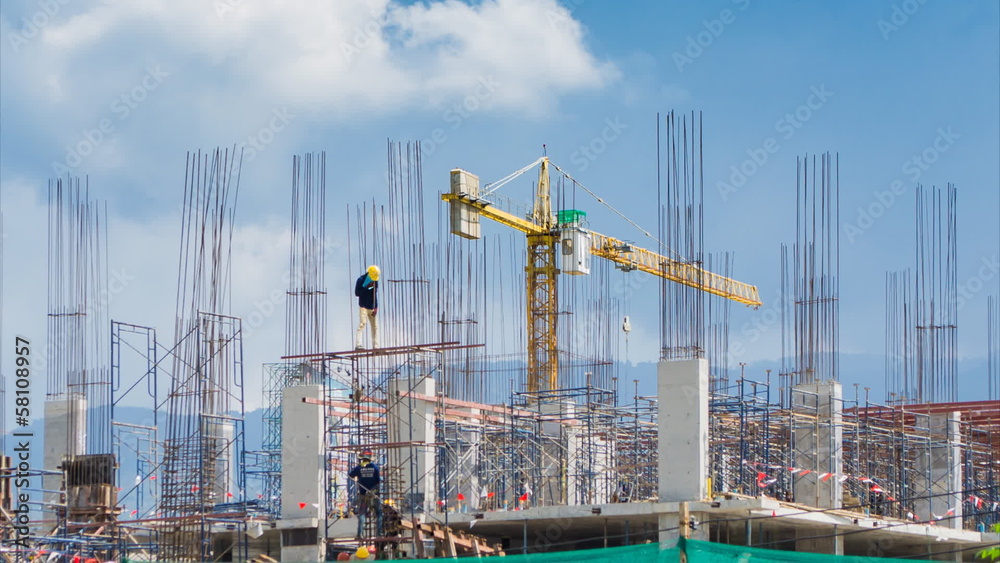time lapse labor working in big construction site (zoom out)