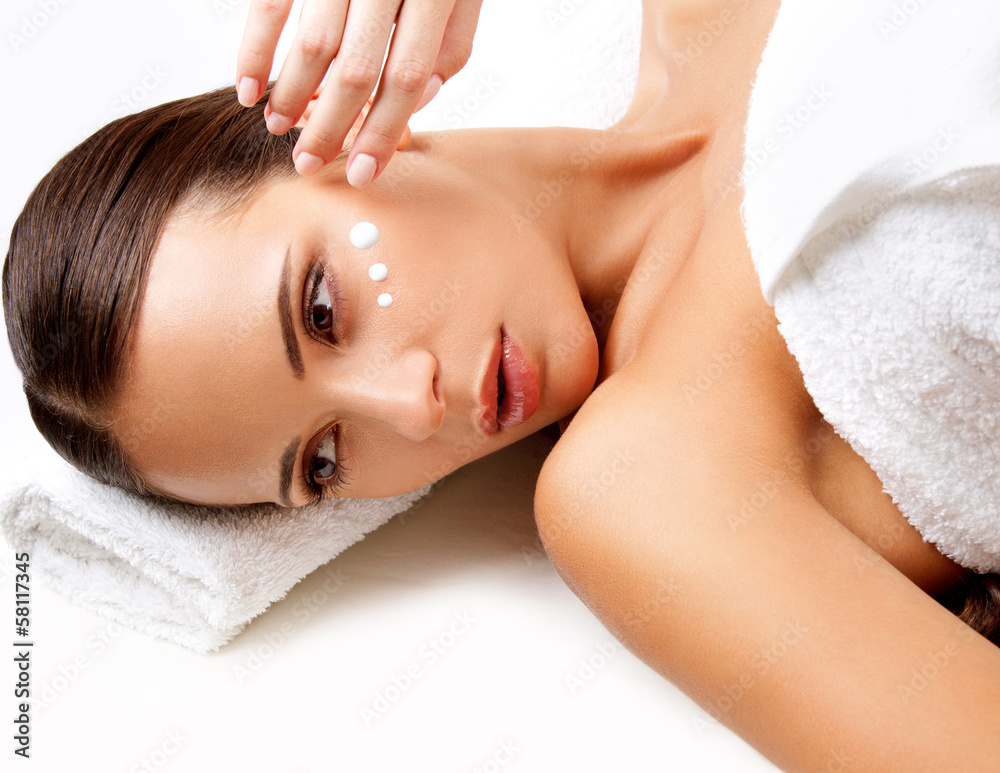 Close-up of a Young Woman Getting Spa Treatment. Cosmetic Cream Close-up of a Young Woman Getting Spa Treatment. Cosmetic Cream