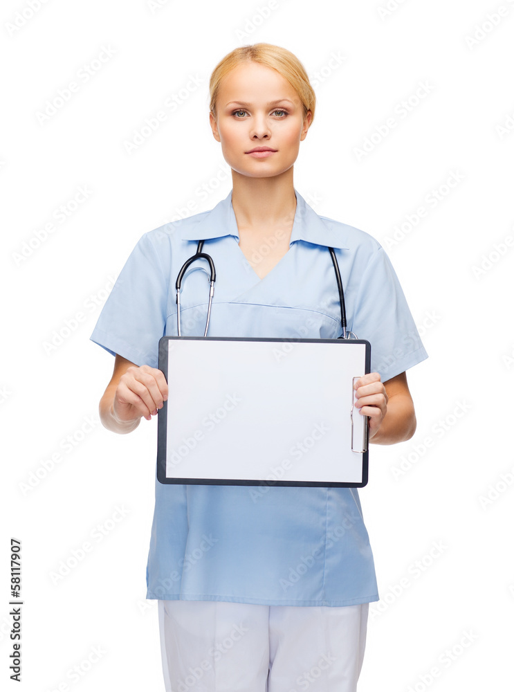 smiling female doctor or nurse with sclipboard smiling female doctor or nurse with sclipboard