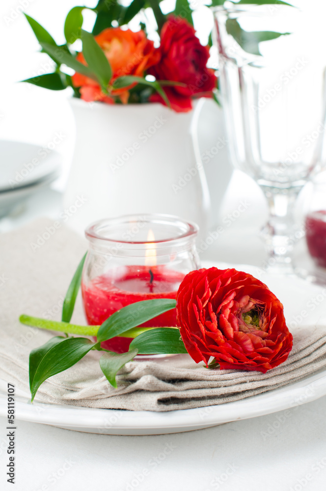 table setting with red buttercup flowers table setting with red buttercup flowers