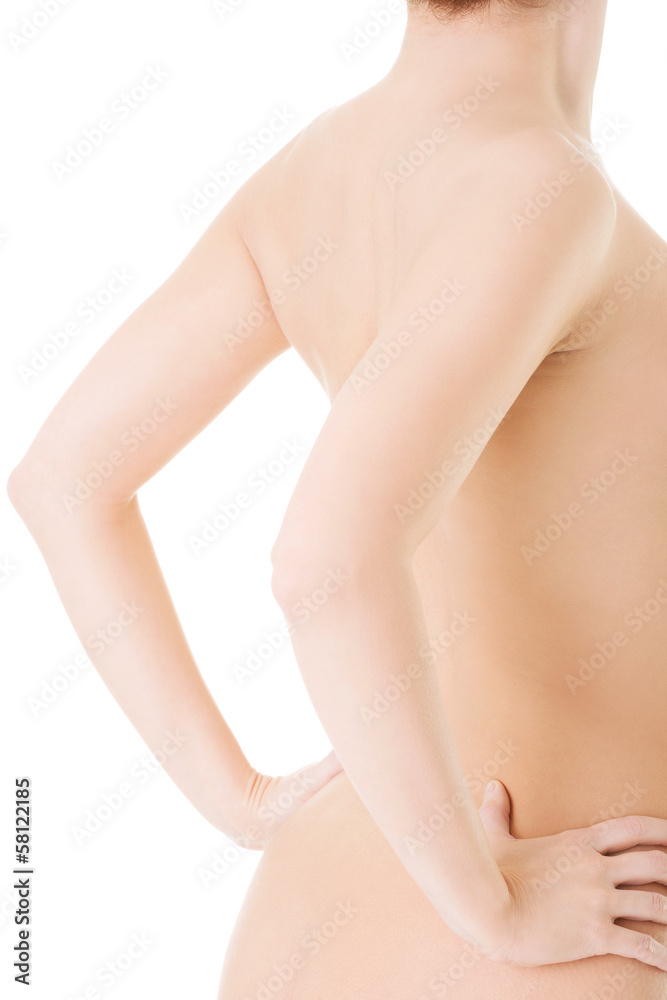 Fototapeta premium Beautiful naked female's body part. Back view.