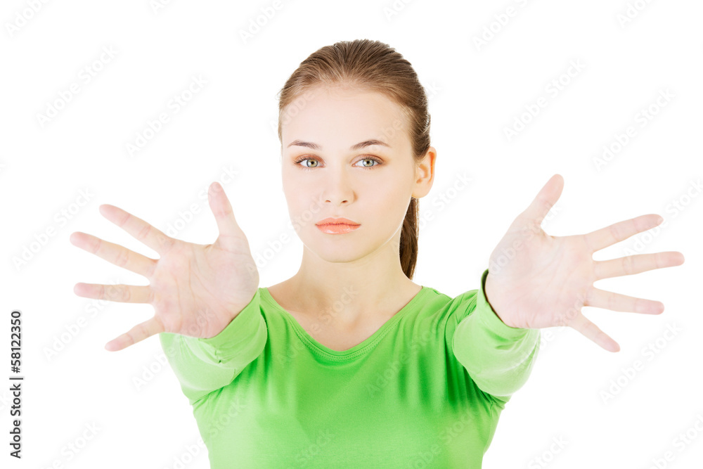 Attractive woman with hands open in front oh her. Attractive woman with hands open in front oh her.